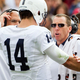 Tim Bream (in sunglasses) checks on Christian Hackenberg during a bowl game last year. Photo: Mark Wallheiser/AP